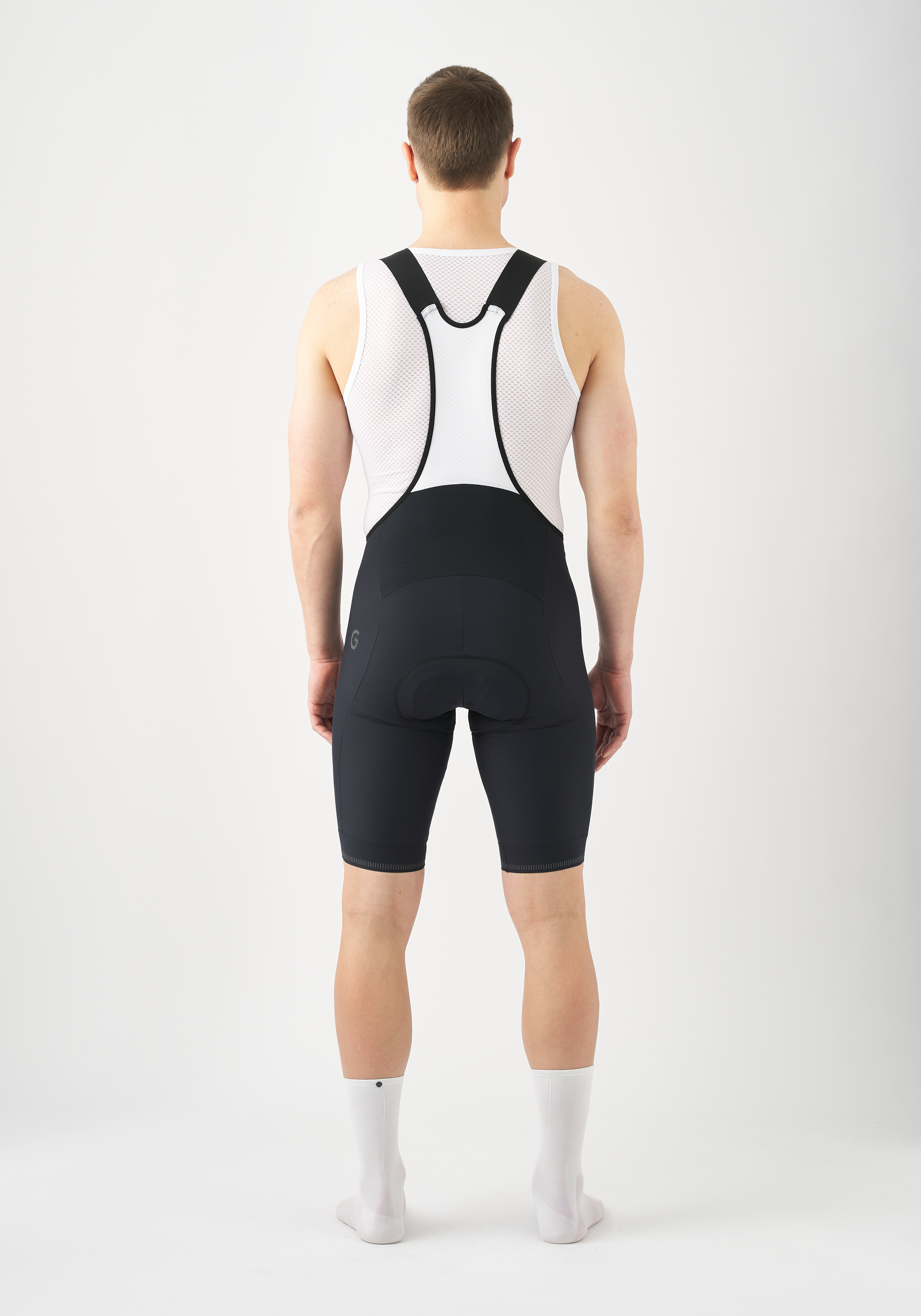  cycling bib shorts, Mesh-Back, schwarze Shorts, sleeveless Trägerhemi, gepolsterte Bibs, Bib-Shorts, Radsport-Bib, Netzrückseite, gepaddete Shorts, schwarz-weiß