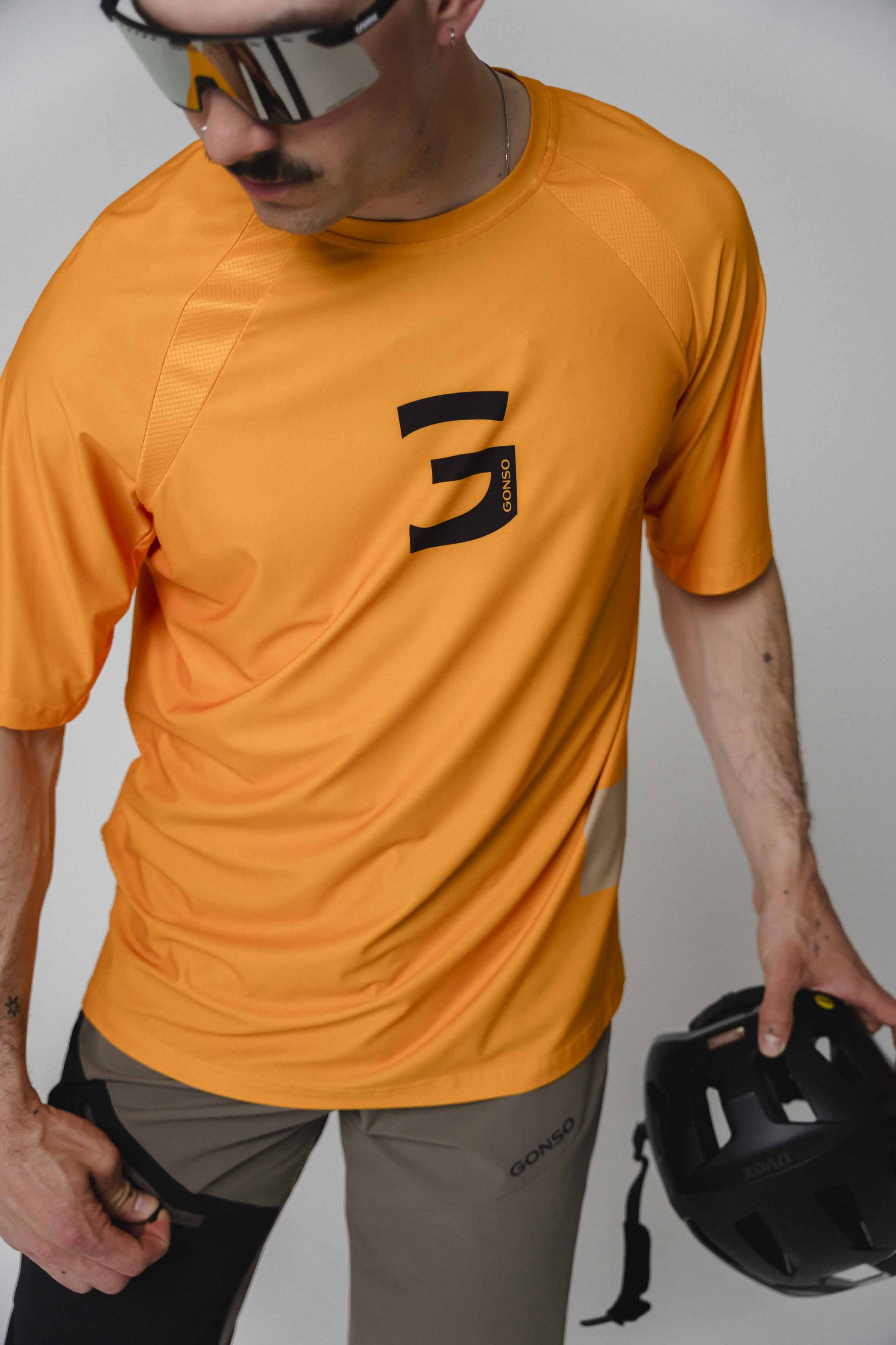 oras, orange shirt, short sleeves, cycling jersey, graphic logo