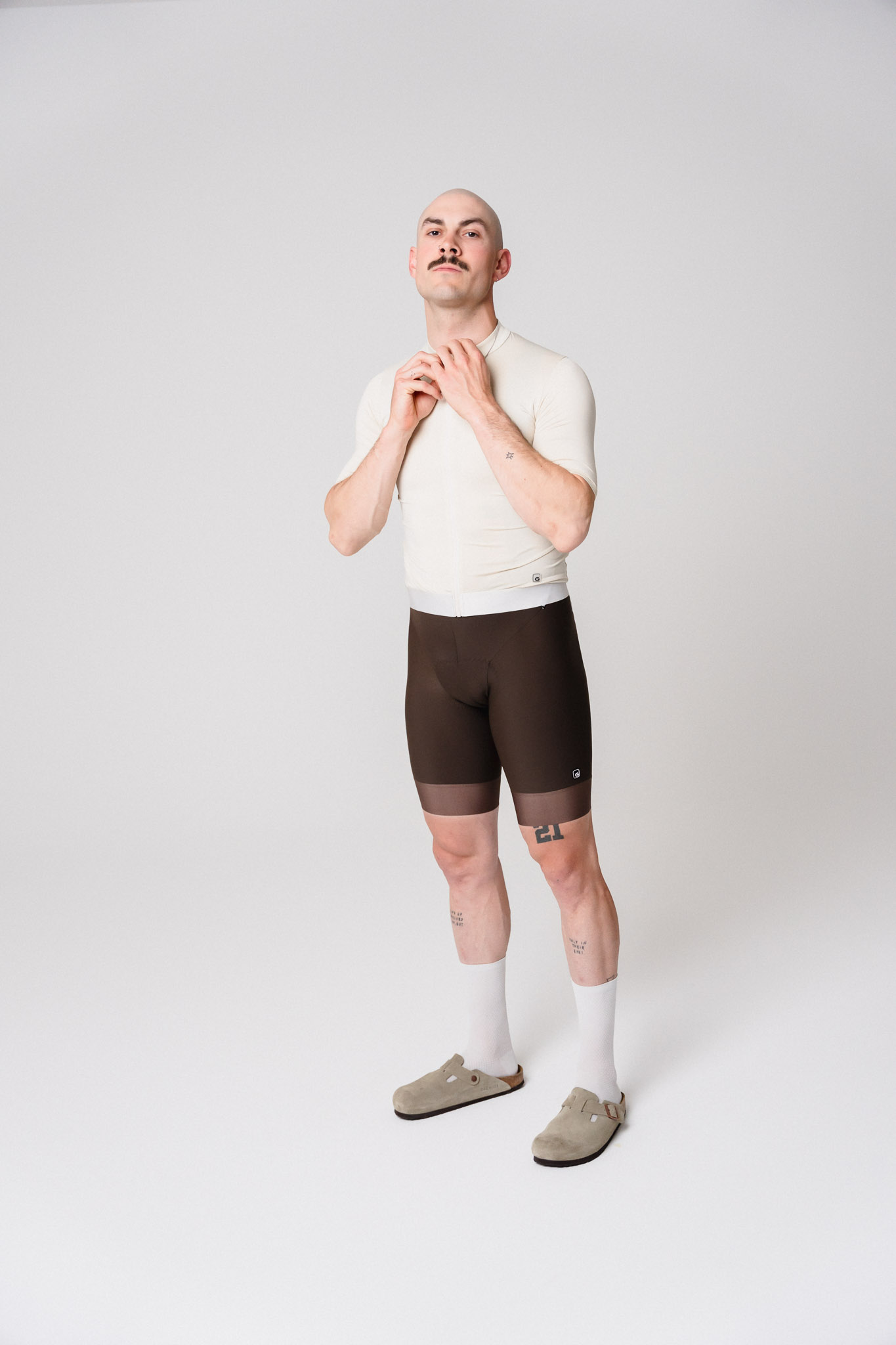 cycling shorts, brown shorts, cream top, compression shorts, socks