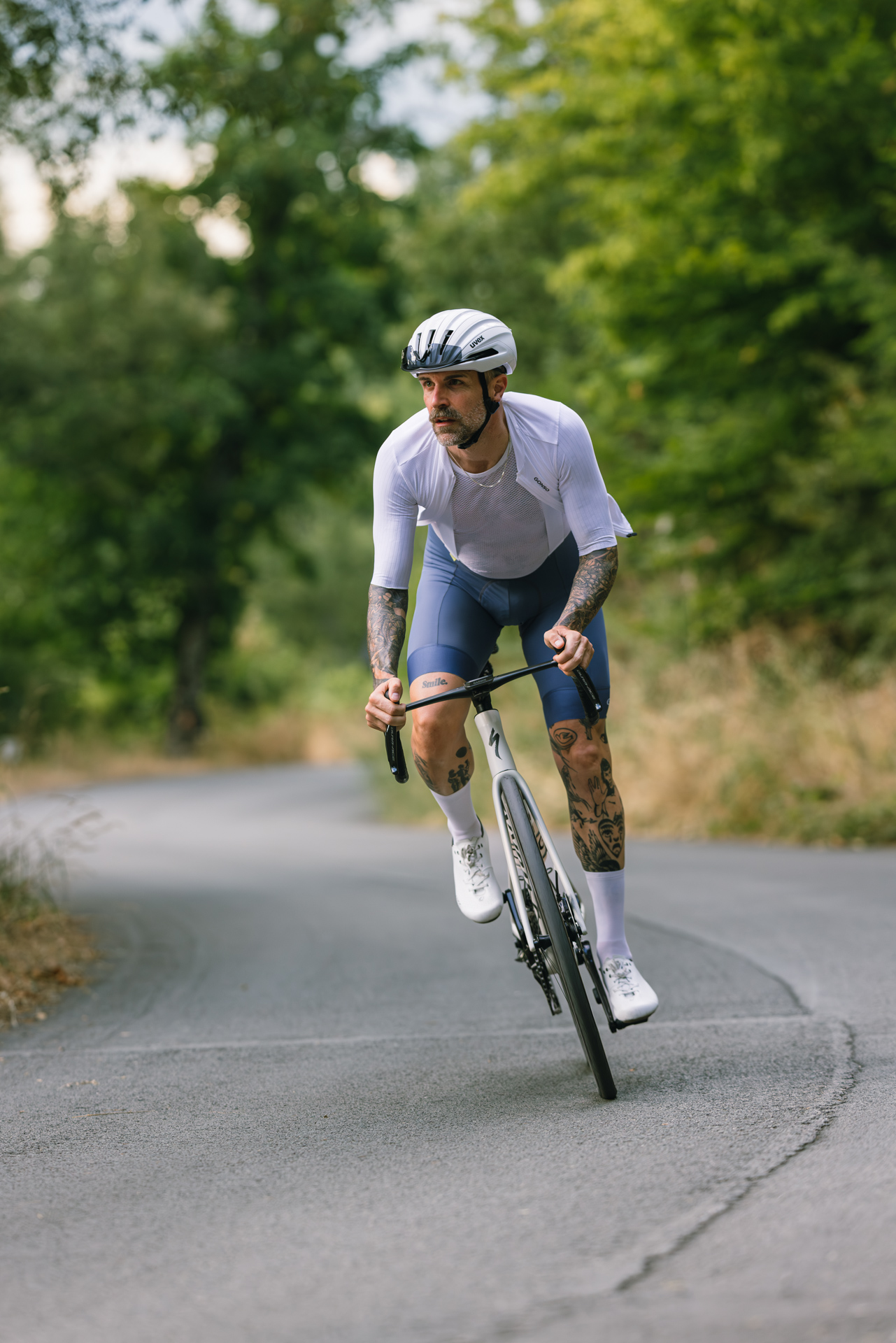 Radsport, Rennrad, Kleidung, Helm, Tattoo-Beine