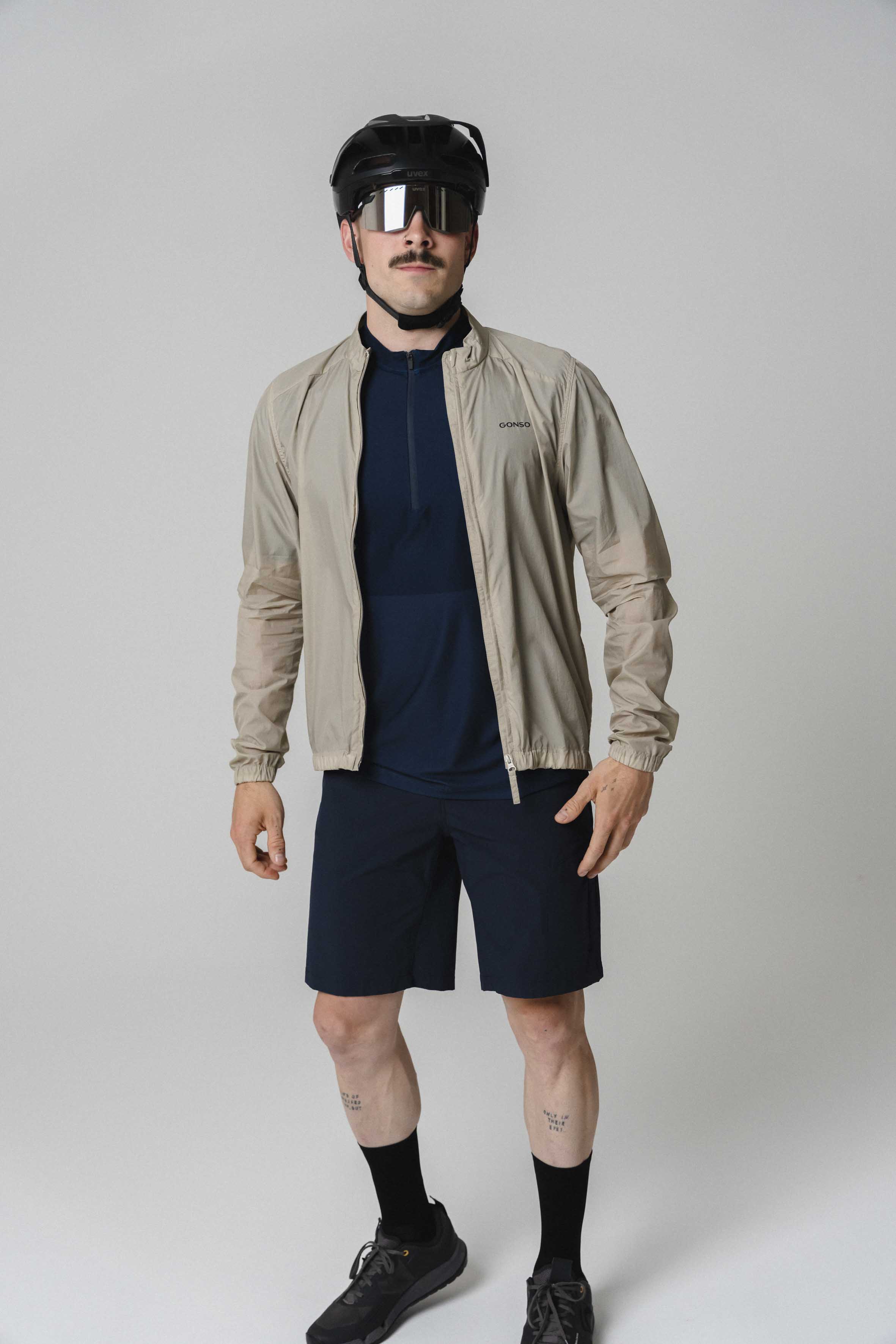 cycling jacket, beige jacket, windbreaker, shorts, cycling gear